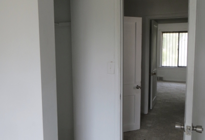 This is upstairs looking from the back room towards the front of the house. A lot of lost space up here. This will be opened up to be an open floor plan and some how prepare for children when they come with their mothers.